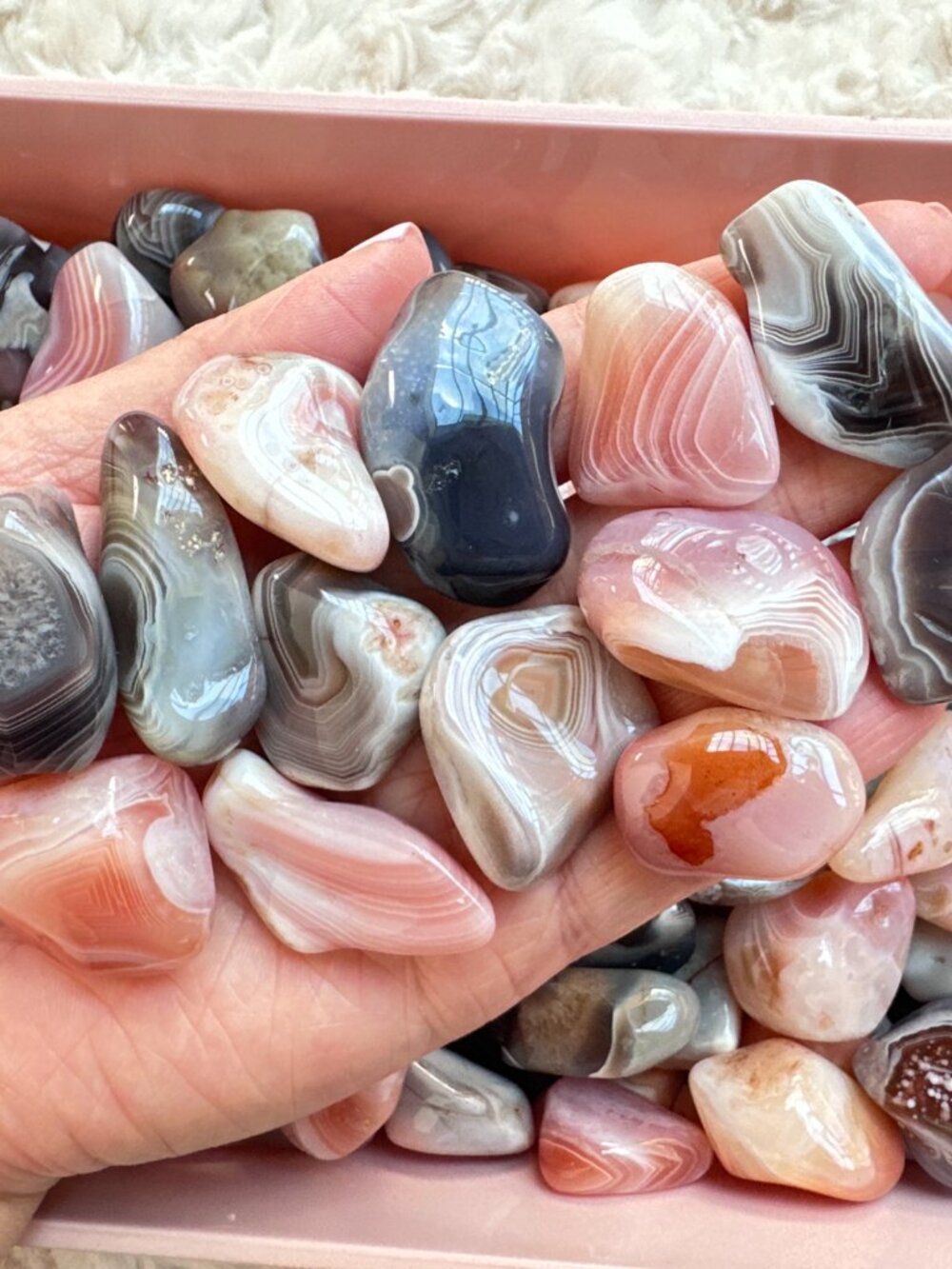 1/2 Pound Lot of Imperfect Botswana, Apricot, and Pink Botswana Agate Tumbles